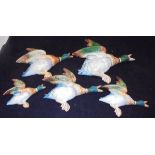 A set of five graduated Beswick mallard wall plaques CONDITION REPORTS Largest duck