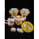 A collection of Bradex Clarice Cliff design china wares to include Wedgewood Caravan appliqué plate,