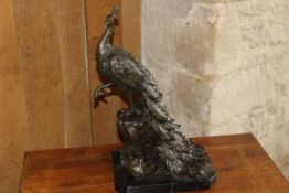 IN THE 19TH CENTURY FRENCH MANNER "Peacock on a rocky outcrop", bronze,