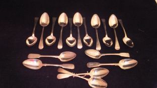 A set of six Victorian silver dessert spoons (by Charles Lias, London, 1844),