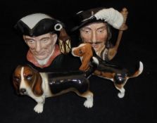 A Beswick figure of a Bassett hound, another similar figure,