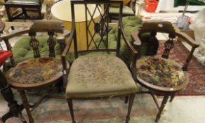 Two mahogany framed elbow chairs with circular seats, turned supports and turned stretchers,