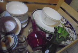 A box containing assorted china wares to include a large majolica style charger and a Poole Pottery