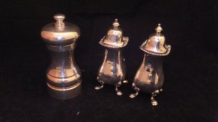 A modern silver "Peter Piper" peppermill of typical form,