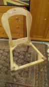 Two hall chair frames on cabriole legs
