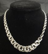 A modern silver fancy link necklace, 2.