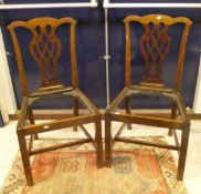 A set of eight early 20th Century mahogany framed dining chairs in the Chippendale taste with