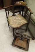 An Edwardian stained beech framed and inlaid corner chair and an elm and iron fruit press
