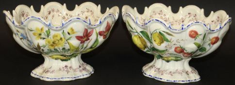 A pair of 19th Century Nove pottery faience monteiths decorated with cherries and plums,