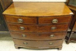 A 19th Century mahogany bow fronted chest of two short over three long graduated drawers to bracket