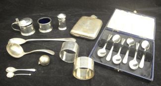 A quantity of various small silver wares to include hip flask, pickle fork, three piece cruet,