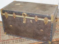 A 20th Century faux leather covered travel trunk