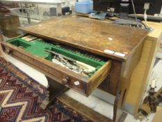 An oak canteen table, the plain top above two fitted drawers with plated cutlery,