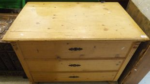A 19th Century Continental pine coffer with rising lid above three dummy drawers flanked by a