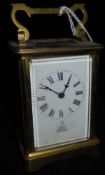 A circa 1900 French lacquered brass cased carriage clock,