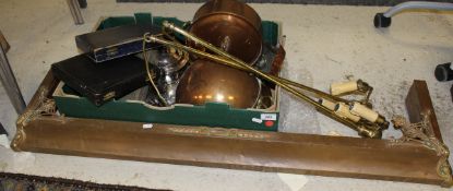 A copper fire kerb, copper saucepan lid, copper mixing bowl,
