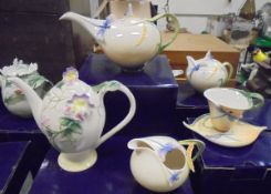 A Franz Porcelain "Dragonfly" teapot, cream jug, sugar bowl and cup and saucer,