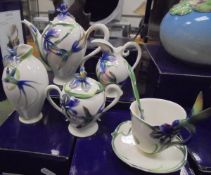A collection of Franz Porcelain "Hummingbird" pattern china wares to include coffee pot, cream jug,