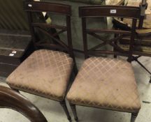 A pair of Regency mahogany bar back dining chairs with upholstered seats and a linen press drawer