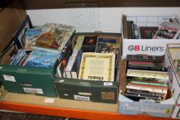 Seven boxes of books including mainly titles relating to naval history to include E.H.H.