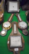 Four various barometers and a modern mantel clock