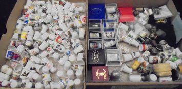 Two boxes of various porcelain and other thimbles