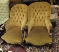A pair of Victorian rosewood framed button back salon armchairs,