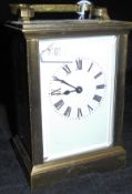 An early to mid 20th Century brass cased carriage clock