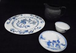 A Chinese Nan King Cargo tea bowl and saucer (Ex.