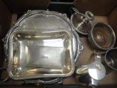 A box of plated ware to include silver and engine-turned cigarette box, tureen base, drinks tray,