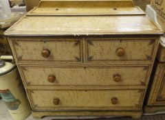 A Victorian chest of two short and two long drawers upon bracket feet,