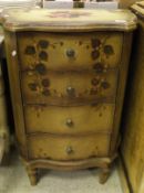 A serpentine fronted chest of four drawers in the Shabby Chic manner decorated with fruit upon a