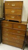 A modern oak military style chest of two short over four long graduated drawers together with a