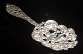 A Victorian cast silver decorative spoon with cherubic decoration to bowl (by Nathan & Hayes,