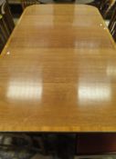A 20th Century mahogany dining table in the Regency taste,