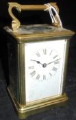 A circa 1900 French lacquered brass cased carriage clock,