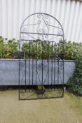 A painted wrought iron gate