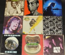 A box of various 33 rpm LP records including Rolling Stones "After-math",