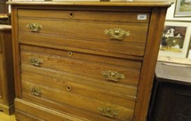 A circa 1900 chest of three long drawers,