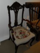 A mahogany framed salon chair with needlework upholstered seat,