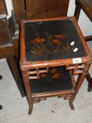 A bamboo and lacquered two tier occasional table decorated with fish and a pen work occasional