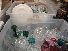A box of assorted glassware to include cranberry glass jugs and wine glasses,