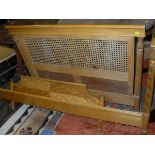 Two beech single bed frames with caned headboards