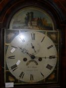 A 19th Century oak and mahogany long case clock with broken arch pediment above a dial marked "W.