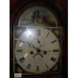 A 19th Century oak and mahogany long case clock with broken arch pediment above a dial marked "W.