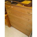 A Merrydew style chest of drawers, the plain top above five long drawers, raised on a bracket base,