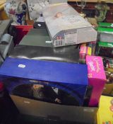 A collection of various Barbie dolls (all boxed), including "James Bond 007",