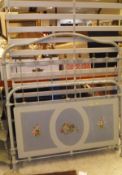 A Victorian cast iron and brass bedstead with painted floral decoration