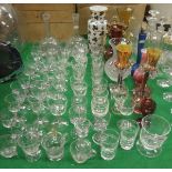 A quantity of various cut glassware including two mallet shaped decanters, milk glass vase,