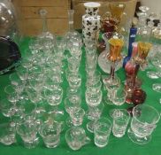 A quantity of various cut glassware including two mallet shaped decanters, milk glass vase,